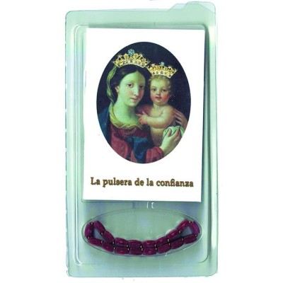 La pulsera de la confianza y el libro con las oraciones de las 18 devociones representadas en ella